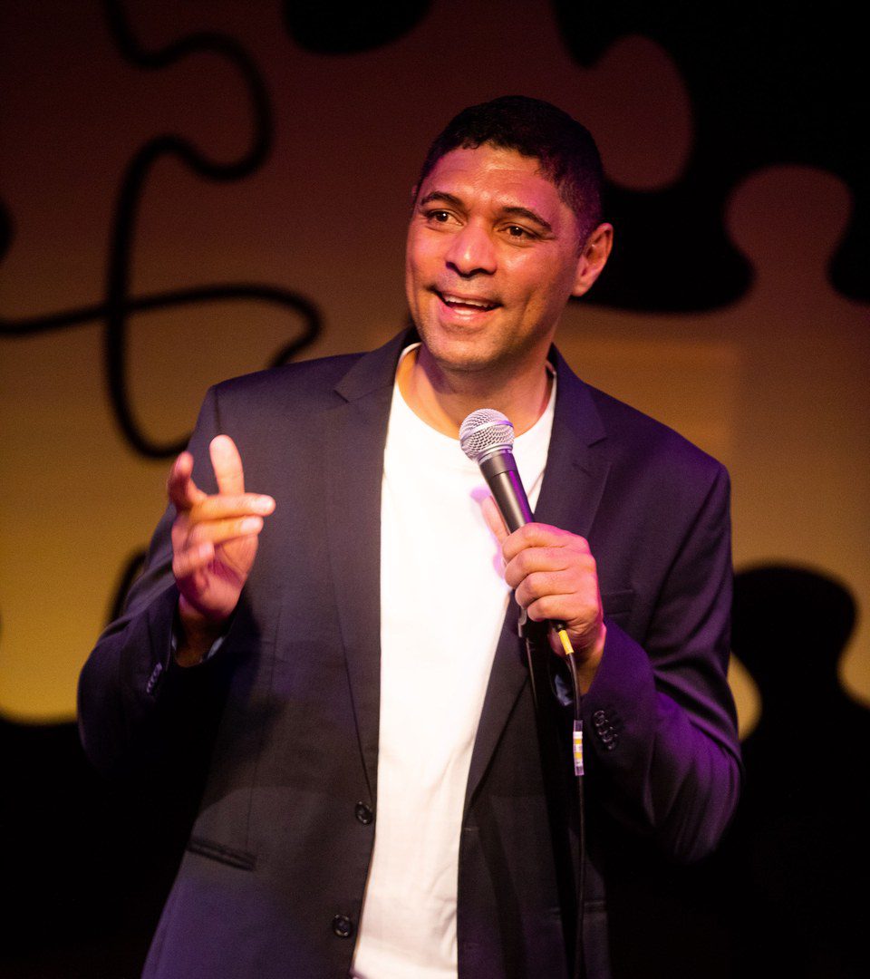 Stuart Taylor South African corporate comedian performing on stage
